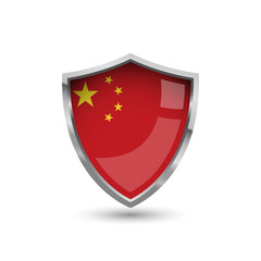 National flag of China. Flag on the metal shield with glare.