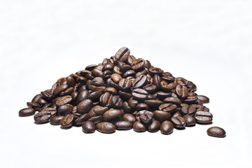 heap of coffee beans on a white background, clipping path included
