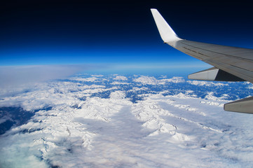 Fototapeta premium The Alps view in Austria from an airplane