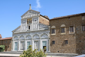 Basilica San Miniato al Monte under blue sky in Florence, Italy