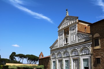 Fototapeta na wymiar Basilica San Miniato al Monte under blue sky in Florence, Italy