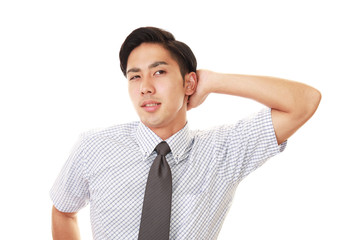 疲れた表情のビジネスマン