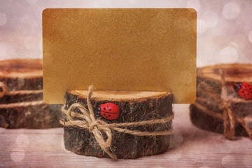 Rustic background with wooden card holder and place for text