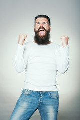 Bearded man with happy yes gesture