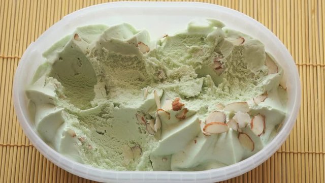 Two person eat the pistachio ice cream
