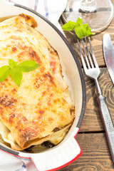 lasagna in the dish on the table