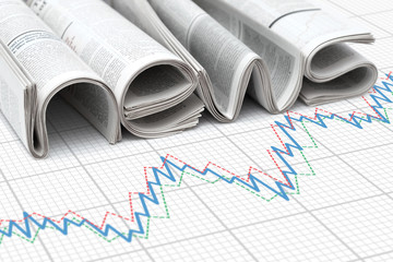 Folded newspapers and graph. Concept of business and financial news