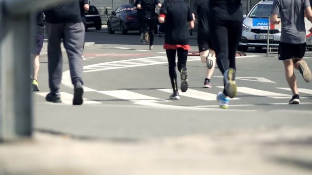 People racing in marathon, super slow motion 240fps
