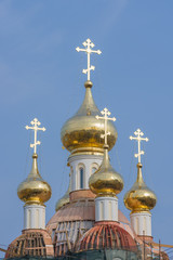 Fototapeta na wymiar Reflections in the church domes