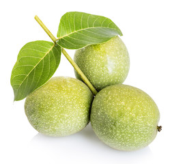 Walnuts green close-up isolated on a white background