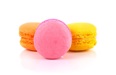French colorful macarons isolated on white