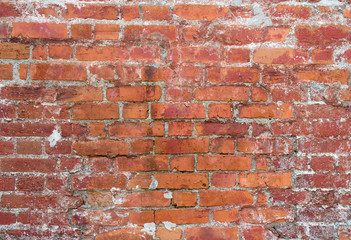 Naklejka premium Red vintage old brick wall texture background