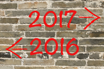sign showing directions for Year 2016 and Year 2017