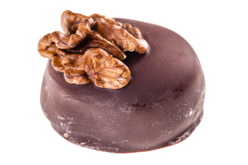 Small walnut praline on white