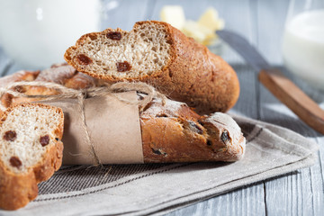 Homemade bread with raisin which served with butter and milk