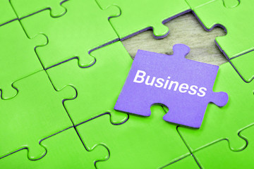 Fototapeta premium Puzzle with word Business
