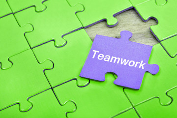 Fototapeta premium Puzzle with word Teamwork