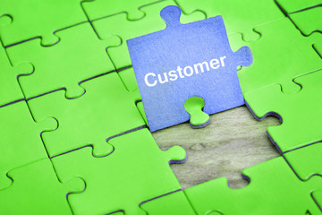 Fototapeta premium Puzzle with word Customer