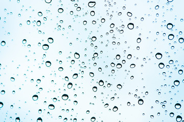 Fototapeta na wymiar Drops Of Rain on glass