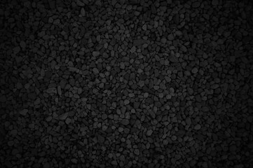 Black stones texture background.
