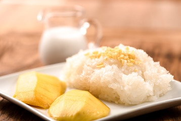 Mango with Sticky Rice on wood table