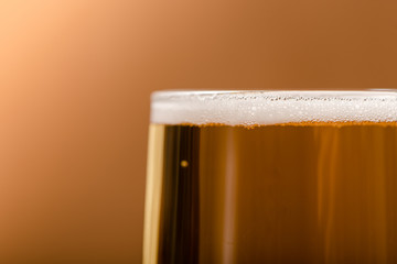 beer in glass on wood table