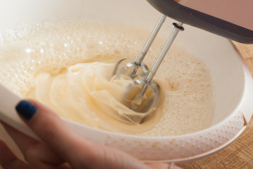 mixer whips cream cake,