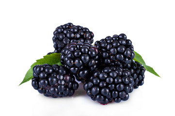 Fresh blackberries with leaves isolated on white background