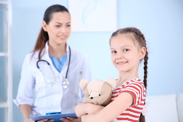 Cute girl visiting a doctor