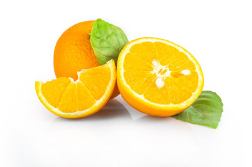 Orange slices with leaves isolated on white background