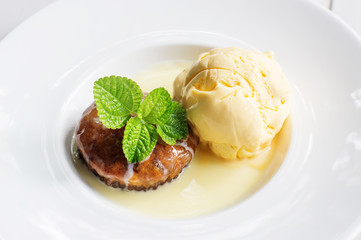 vanilla ice cream and date cake.