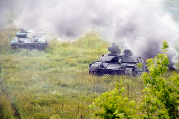 Fototapeta na wymiar Main battle tank at a firing range in summer day