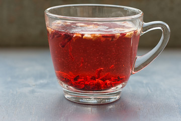 Red fruit tea in transparent glass Cup