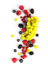 Various fresh summer fruits and berries isolated on a white background. Top view.