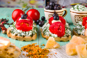 Sandwiches with tomatoes, spices and cheese