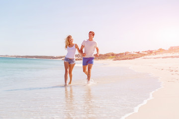 Romantic young couple on the beach