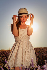 Portrait of a pretty woman in the lavender fields