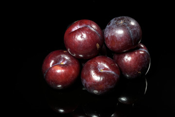Plum Fruit with Black Background