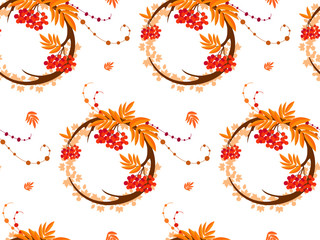 The pattern in the form of a circle formed by the branches and berries of rowan. The pattern in the autumn style on a white background. Also on the background can be seen maple leaves.
