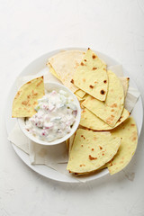 tortillas chips with vegetables sauce