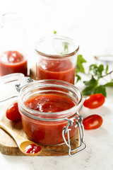Homemade ketchup with tomatoes, chili and peaches