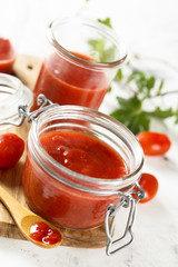 Homemade ketchup with tomatoes, chili and peaches