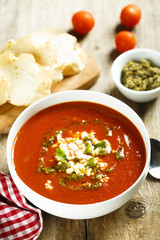 Tomato soup with cheese and pesto sauce