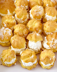 Cream puffs in a white box