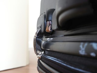 Close-up suitcase combination lock.