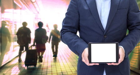 Businessman hand holding tablet computer