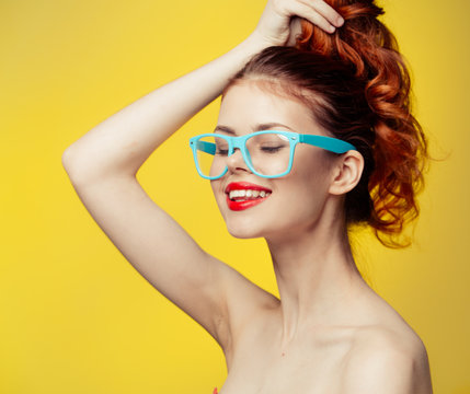 woman in blue glasses
