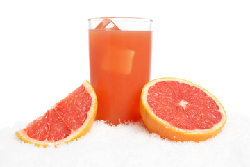 Grapefruit juice,ice cubes with grapefruit on ice on white