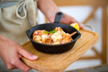 Grilled shrimps on frying pan
