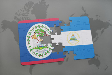 puzzle with the national flag of belize and nicaragua on a world map background.